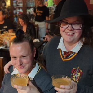 Witches at The Sneaky Cauldron drinking their First Feast Cocktails, brewed during a Magical Mixology Class.